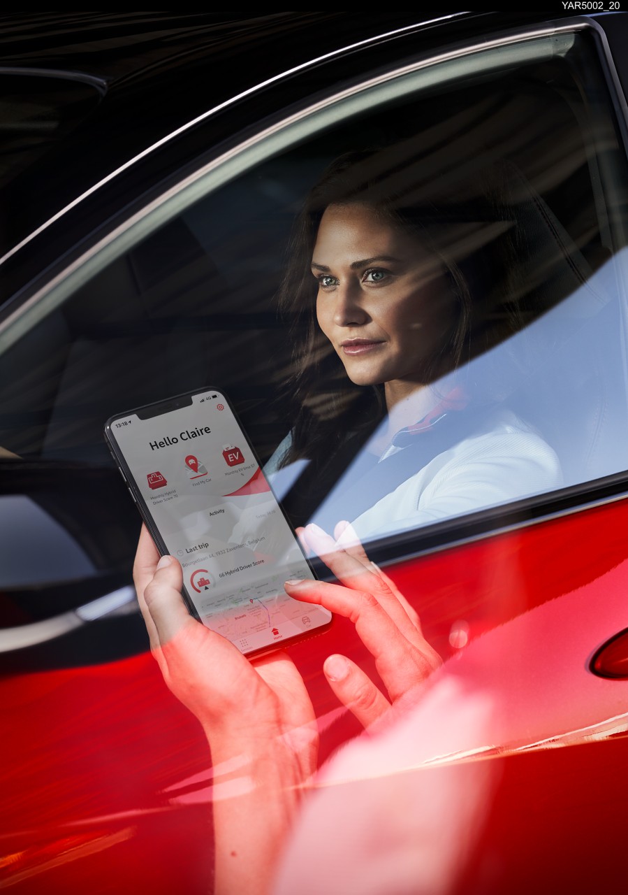 Woman in car using an app